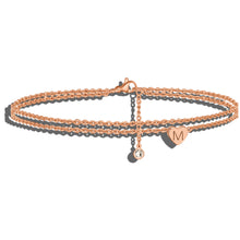 Elegantes Doppelketten-Armband mit Herzanhänger und funkelndem Charm